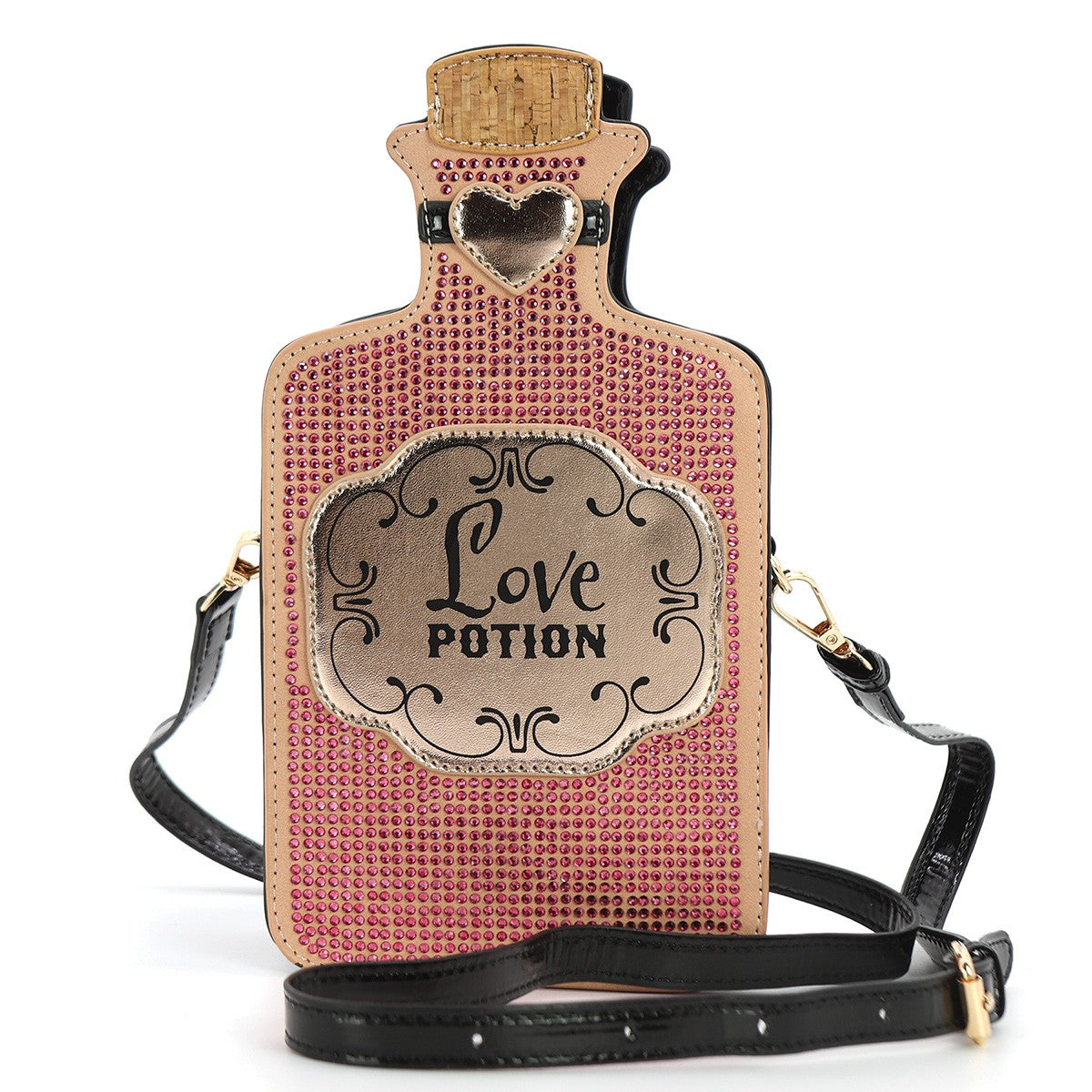 A novelty crossbody bag designed to look like a 'Love Potion' bottle, featuring pink rhinestone-embellished body, tan faux-leather trim, cork top, heart-shaped cutout, and a black shoulder strap.